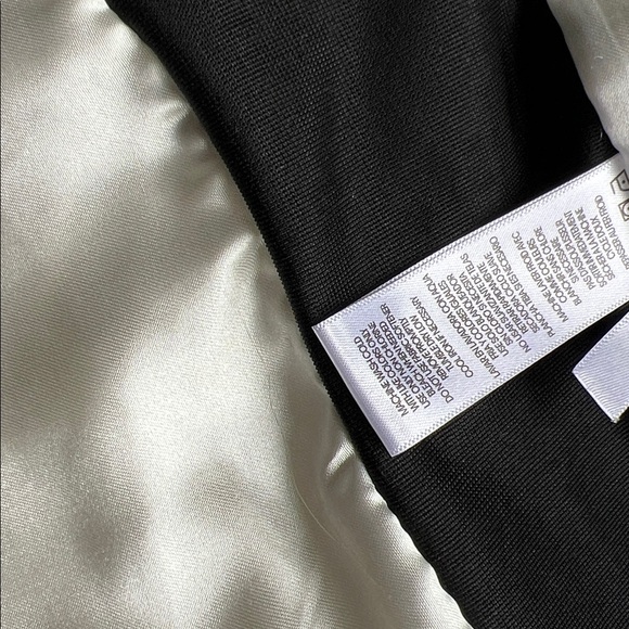 Cream and black quilted fitted vest by Calvin Klein with ribbed knit details sm - Picture 9 of 11